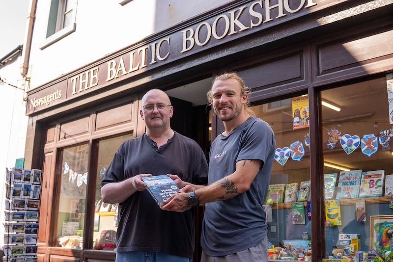 The brothers delivered a signed copy of their new book to the Baltic Bookshop in Stornoway