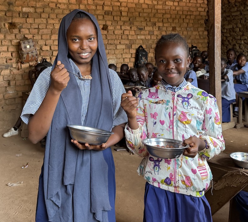 Mary’s Meals helps children like Samar (left) from South Sudan, by providing them with a daily meal and hope for a brighter future. Picture by Mary’s Meals.